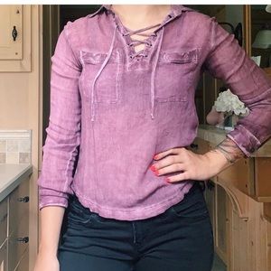 Pinkish-purple colored blouse